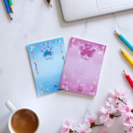 "Blue and Pink paw print A6 hardback notepad with durable binding and stylish design, ideal for daily use"
