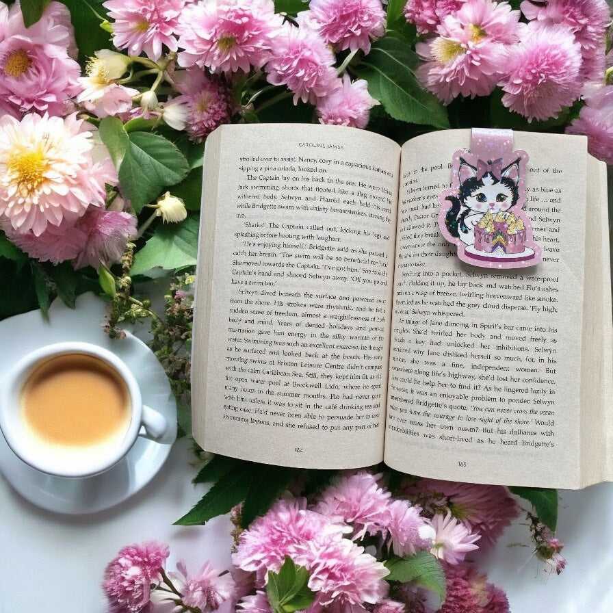 "Adorable magnetic bookmark featuring cute kitten with cake design and holographic sparkle accents, perfect for cat lovers"
